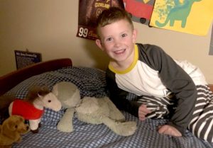 A happy Travis after Froggy is returned